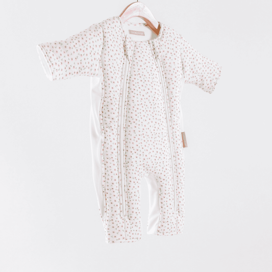 Girls Sleepsuit 3-6 months in pink flower print on white background