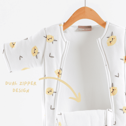 White sleepsuit with lemon print on a hanger, highlighting a double zipper design.