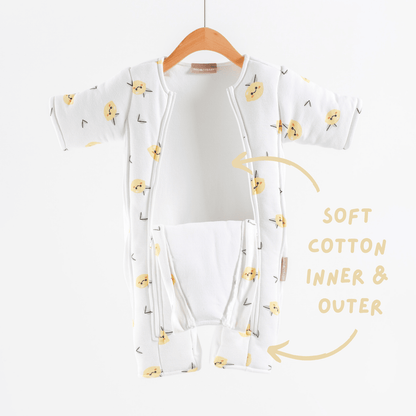 White baby transition suit with lemon pattern on a hanger against a white background highlighting soft cotton fabric inner and outer